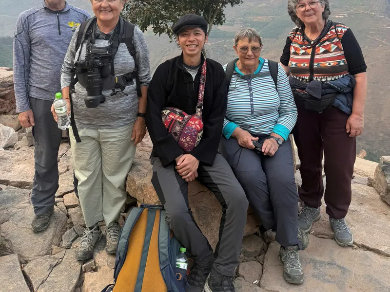 A trekking group at a viewpoint on the Forest & Stone trip